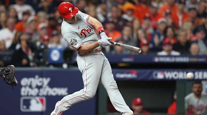 Oct 29, 2022; Houston, Texas, USA; Philadelphia Phillies catcher J.T. Realmuto (10) hits a single during the eighth inning against the Houston Astros in game two of the 2022 World Series at Minute Maid Park.